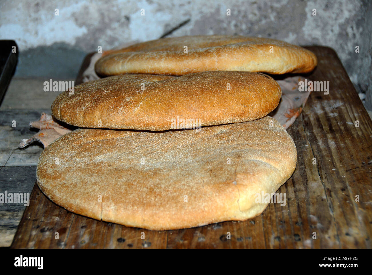 Fresh baked flat bread bakery medina Marrakech Morocco Stock Photo