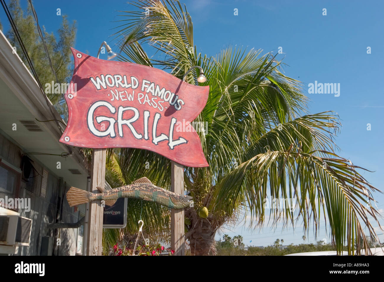 Sign at New Pass Grill and Bait Shop on City Island overlooking New pass  and Sarasota Bay in Sarasota Florida Stock Photo - Alamy