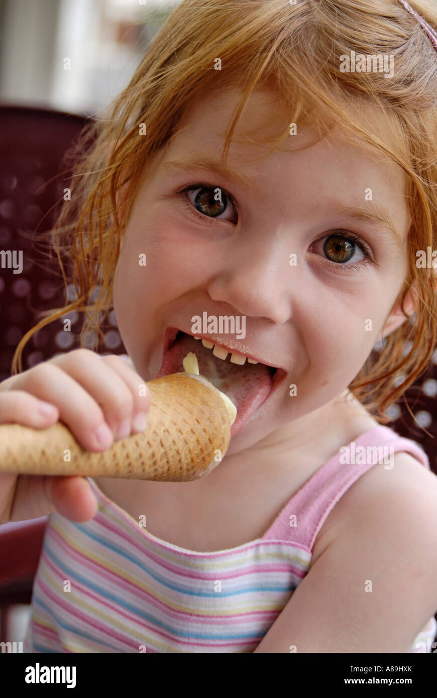 Child eating ice-cream Stock Photo