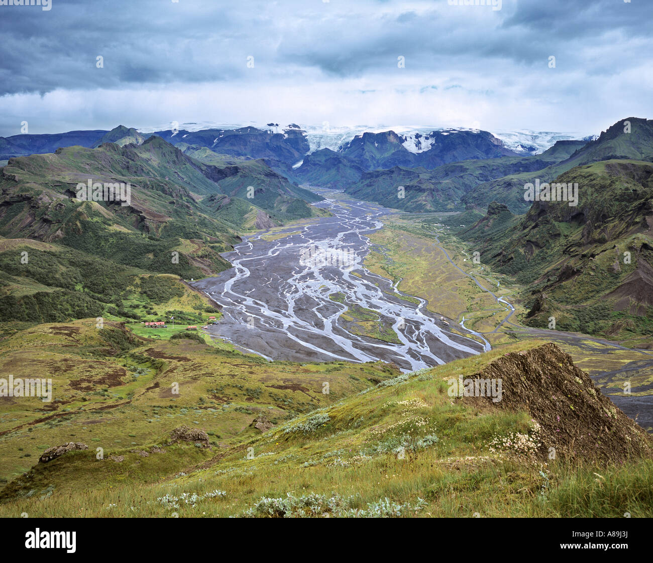 View over the river Krossa to the glacier Myrdalsjoekull, Thorsmoerk, Iceland Stock Photo