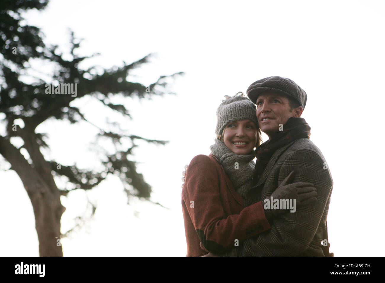 Couples holding each other hi-res stock photography and images - Alamy