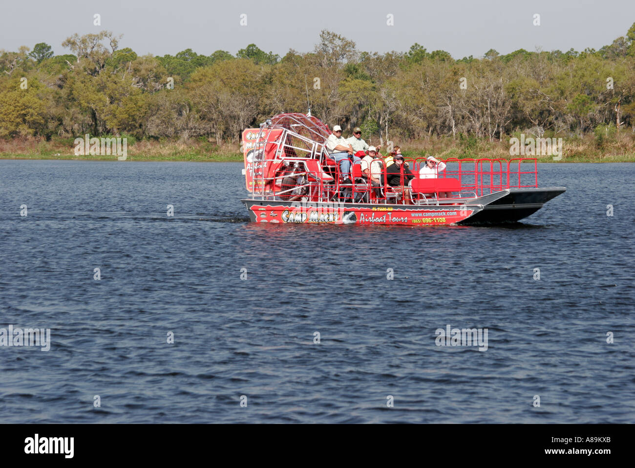 Florida Lake Kissimmee,Camp Mack's River water Resort Airboat Tour,passenger passengers rider riders,visitors travel traveling tour tourist tourism la Stock Photo