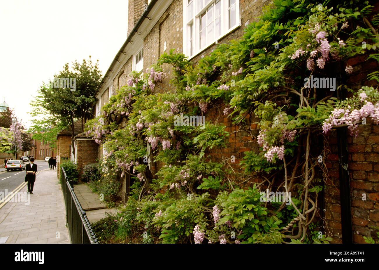 Berkshire Eton College Wisteria clad building and students walking to school Stock Photo