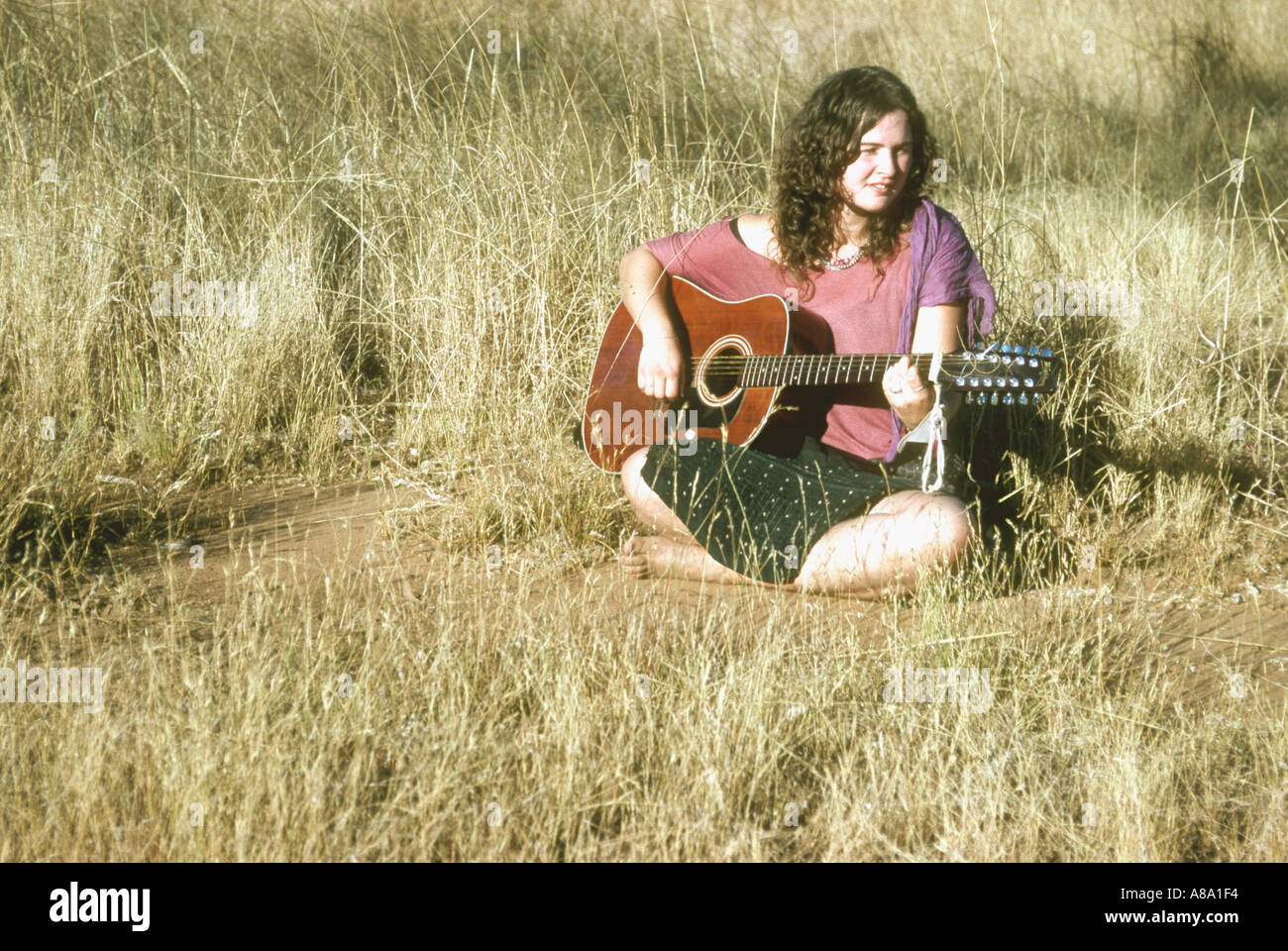 Girl guitar player in the outback Australia Stock Photo Alamy
