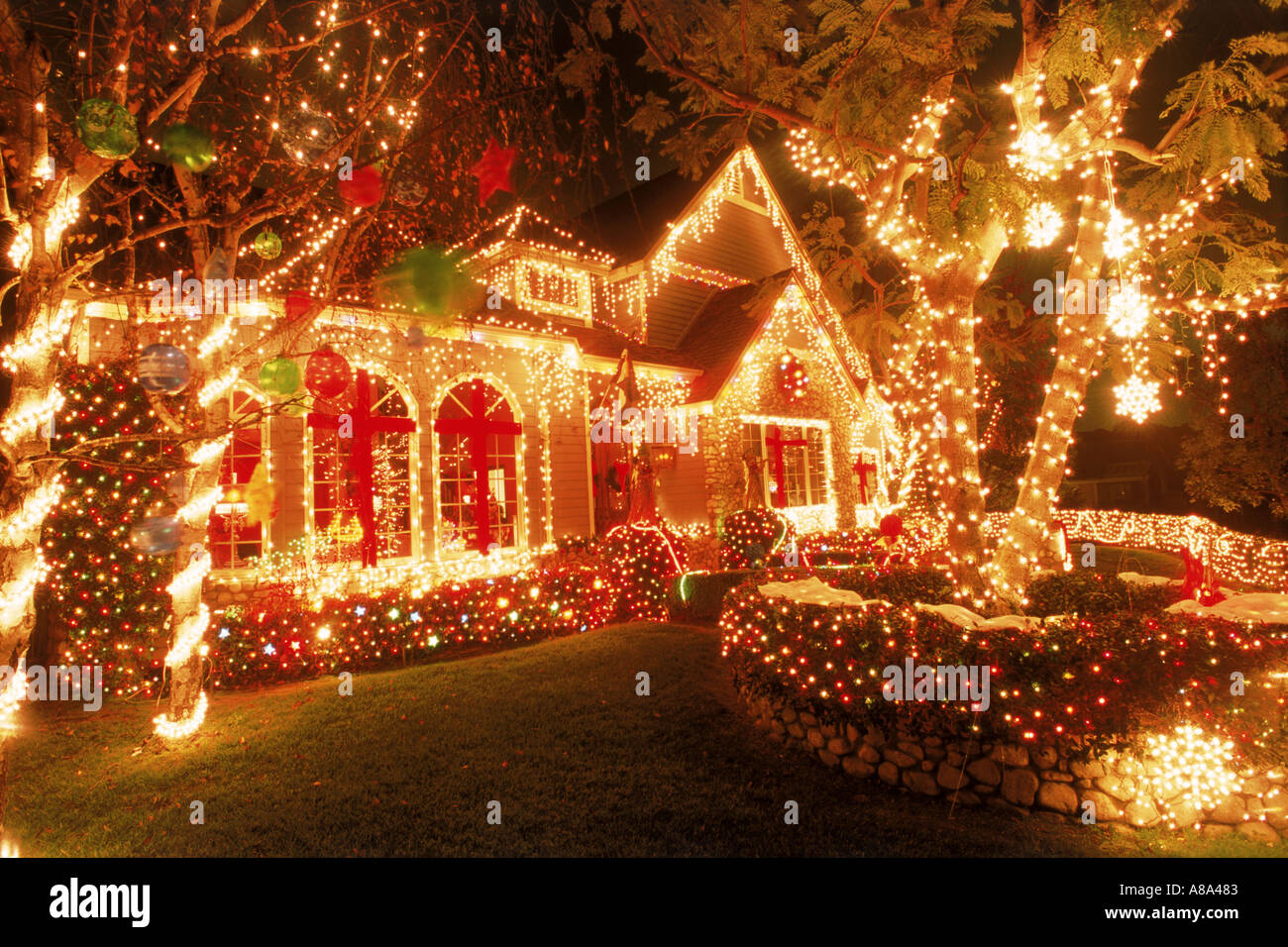 House in California with Christmas decorations at night Stock Photo