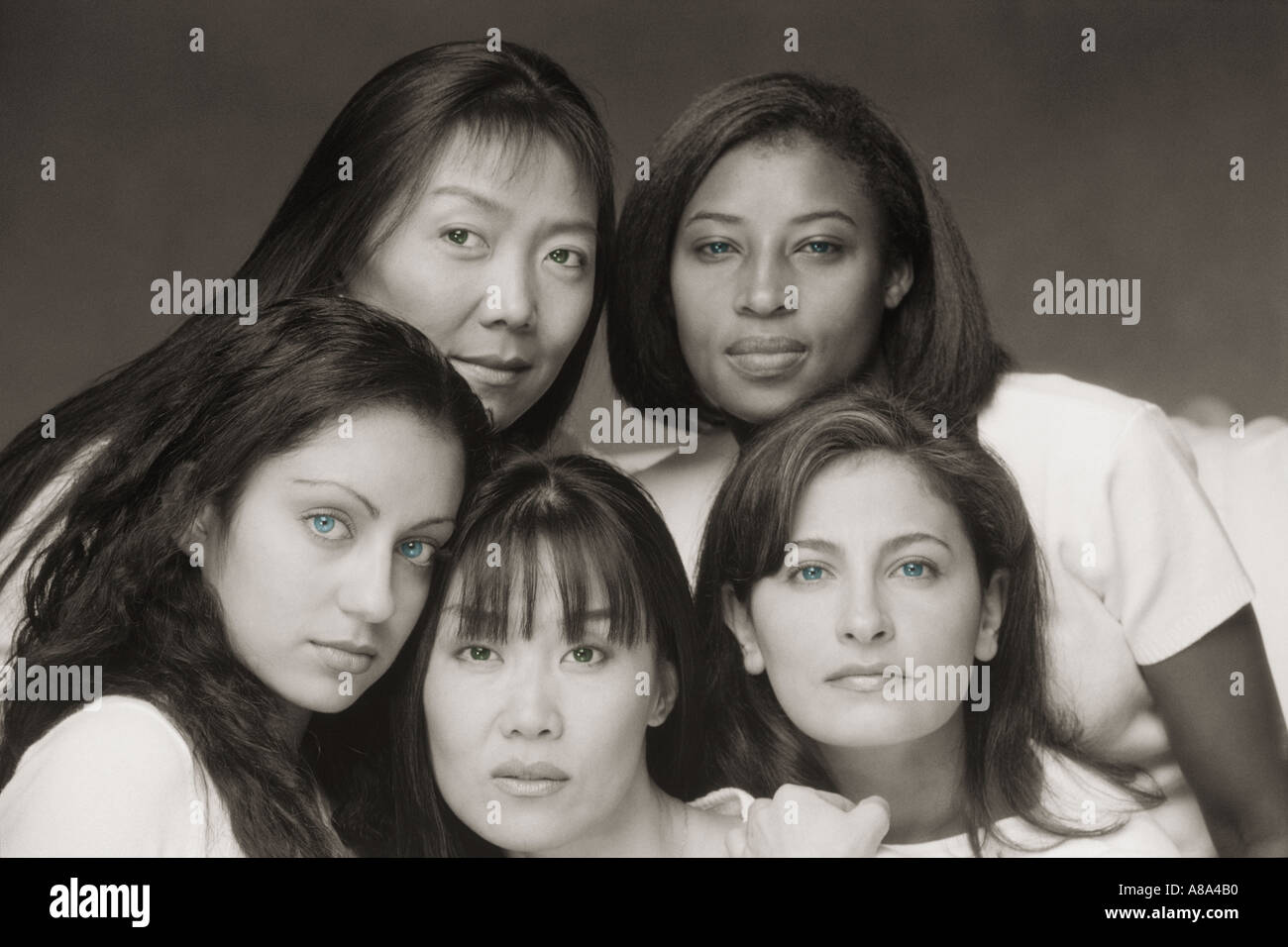 Five beautiful women and four different races Stock Photo