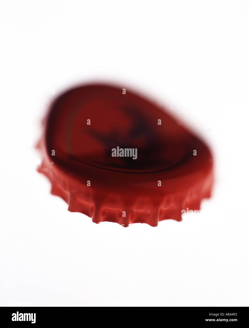 bottle top red from a bottle of beer or lager Stock Photo