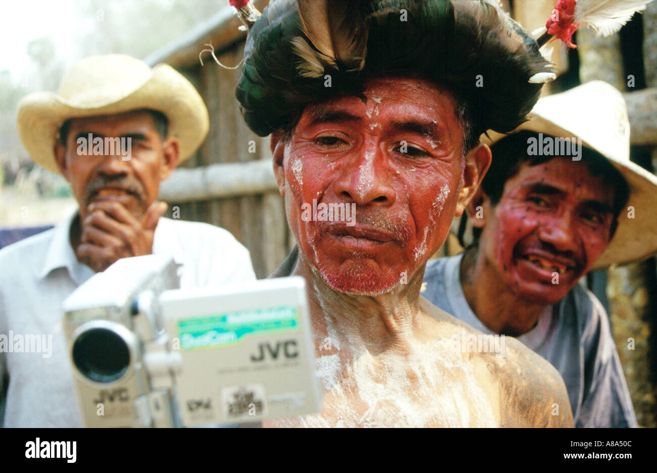Paraguay Shaman Ayoreo Indians watching a playback of themselves Stock Photo