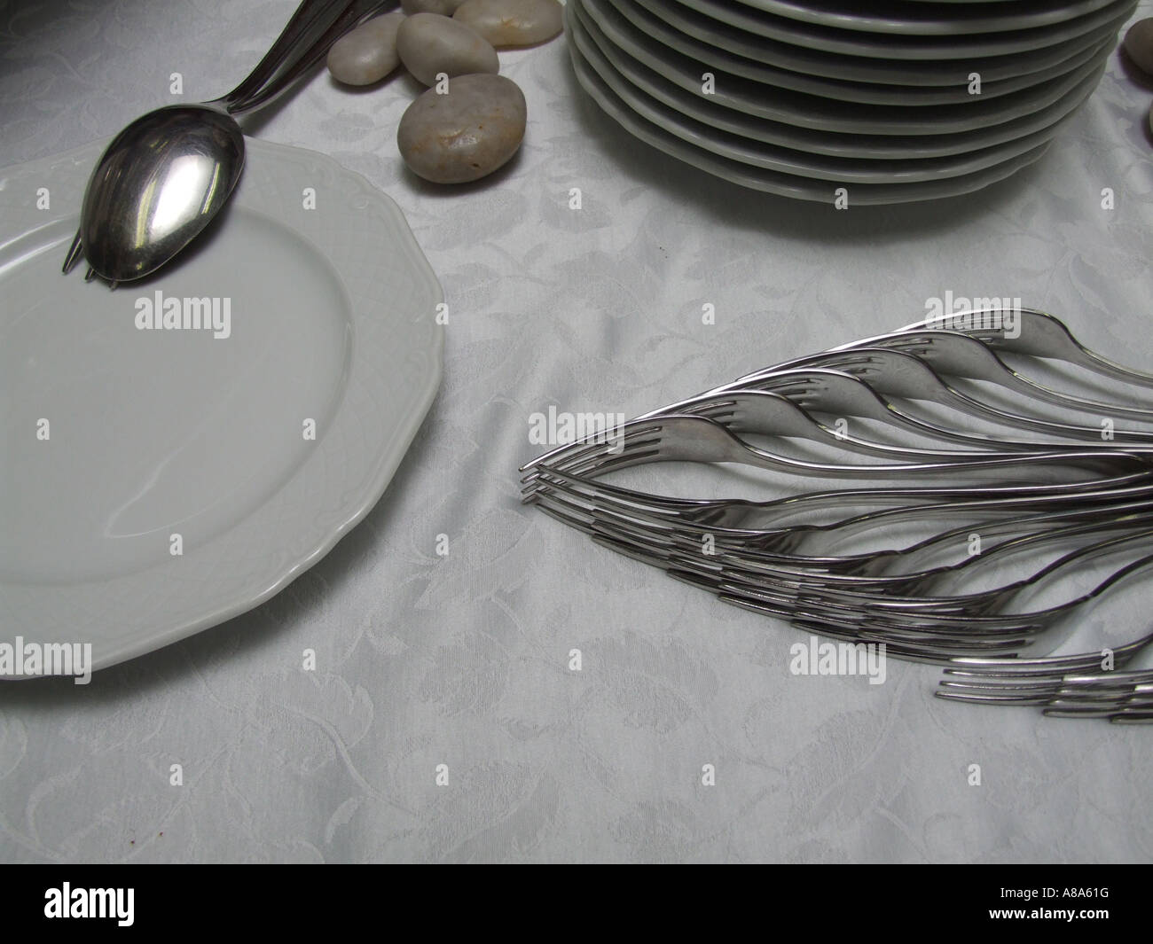 set of forks on buffet table Stock Photo Alamy