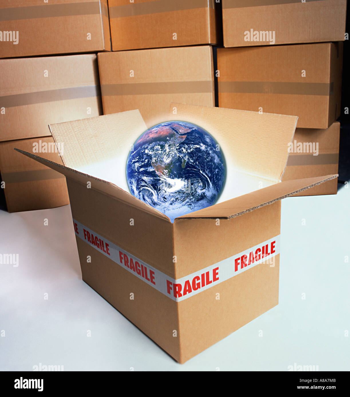 Earth in a box marked fragile Stock Photo