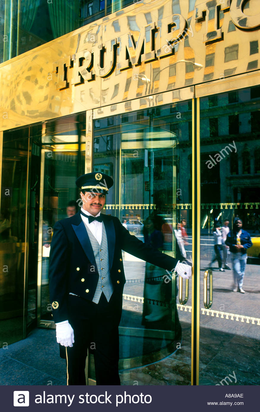 New York City Doorman Holding Door Open Stock Photos New York