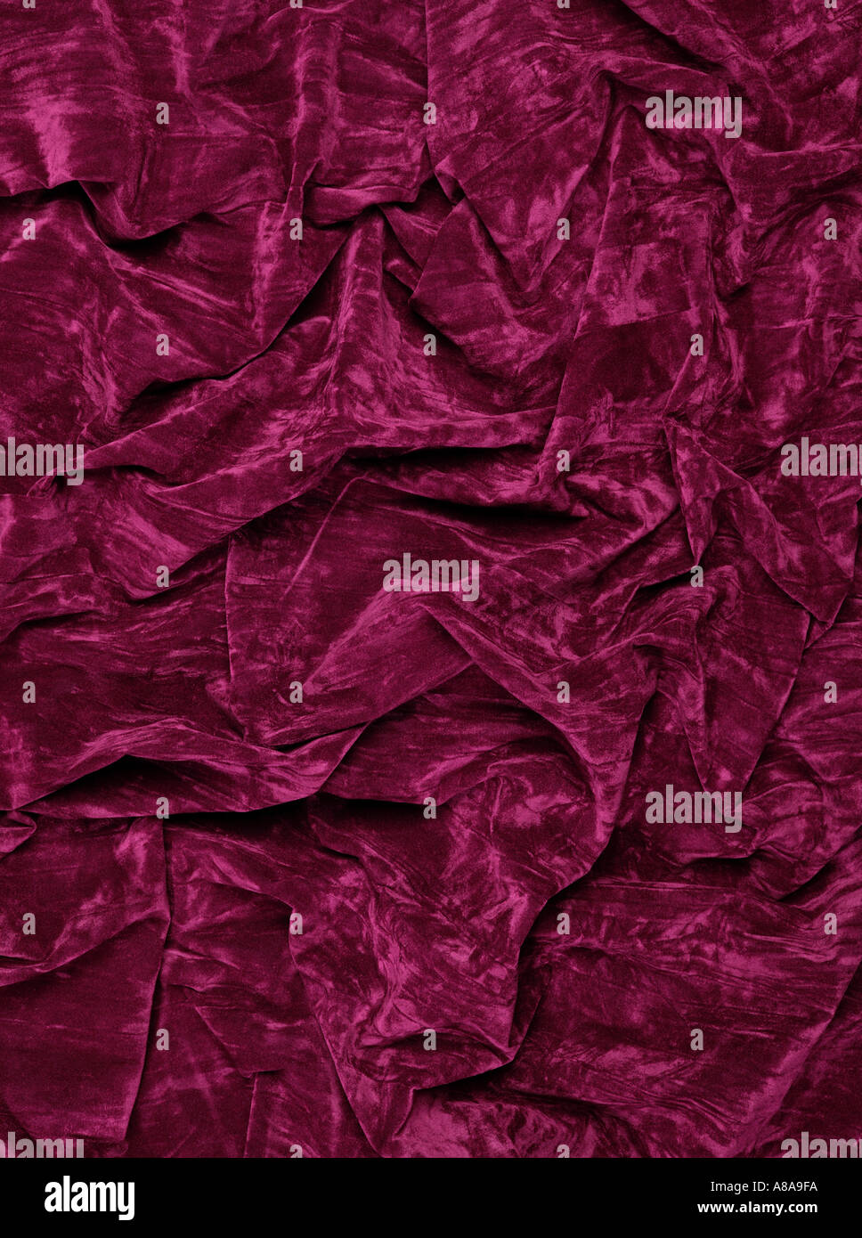 MAROON VELVET FABRIC BACKGROUND Stock Photo