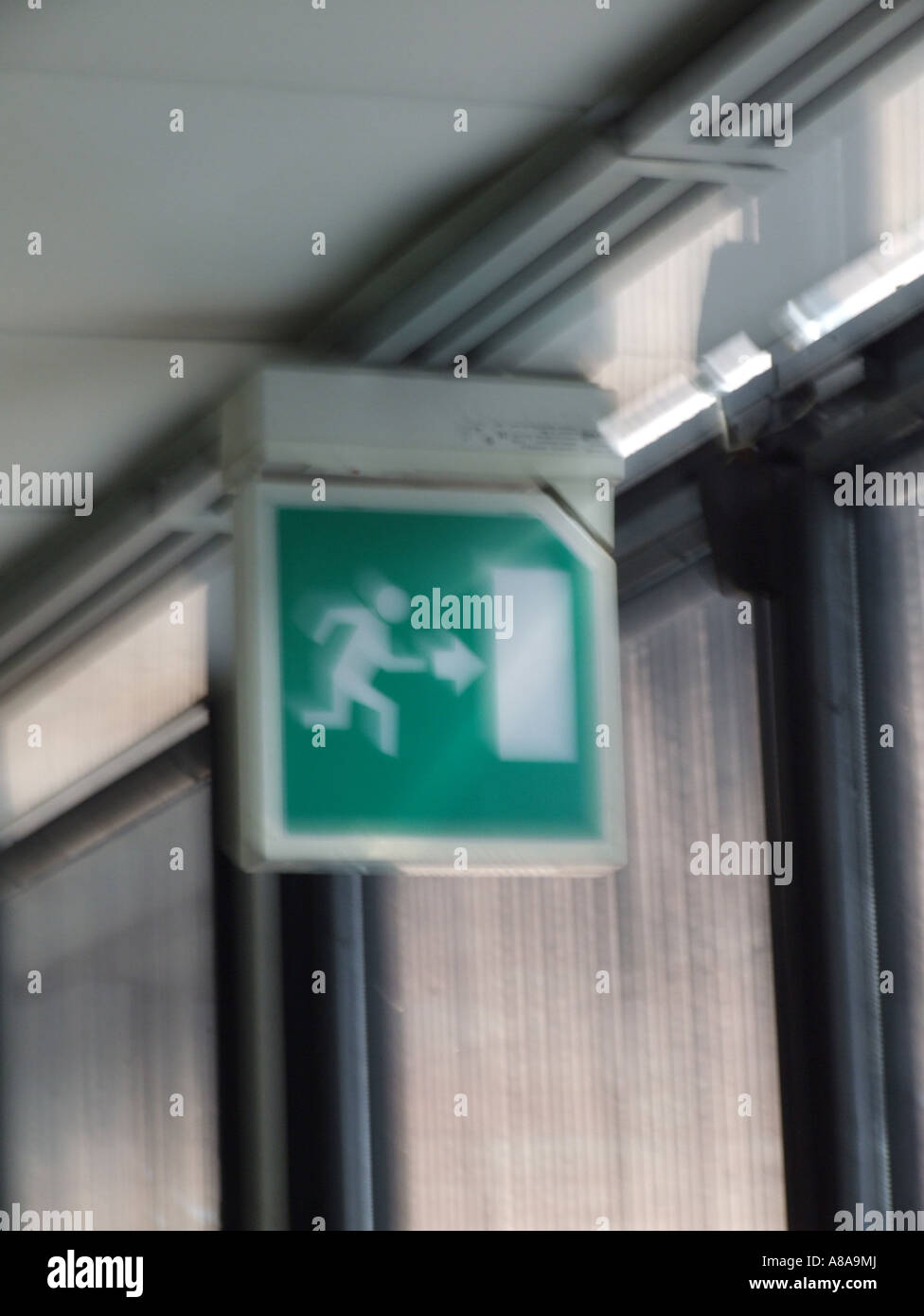 emergency exit sign in dark room Stock Photo Alamy