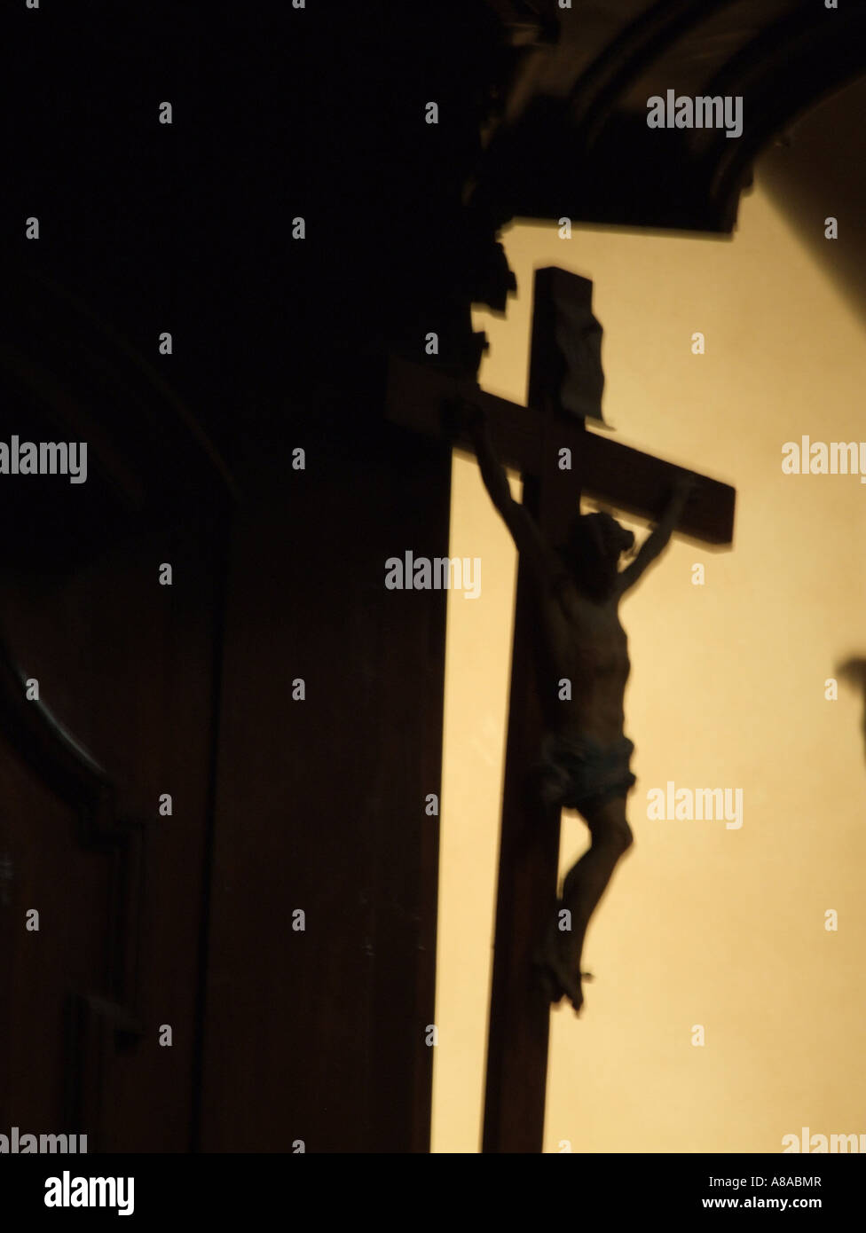 jesus on cross in church in italy Stock Photo - Alamy