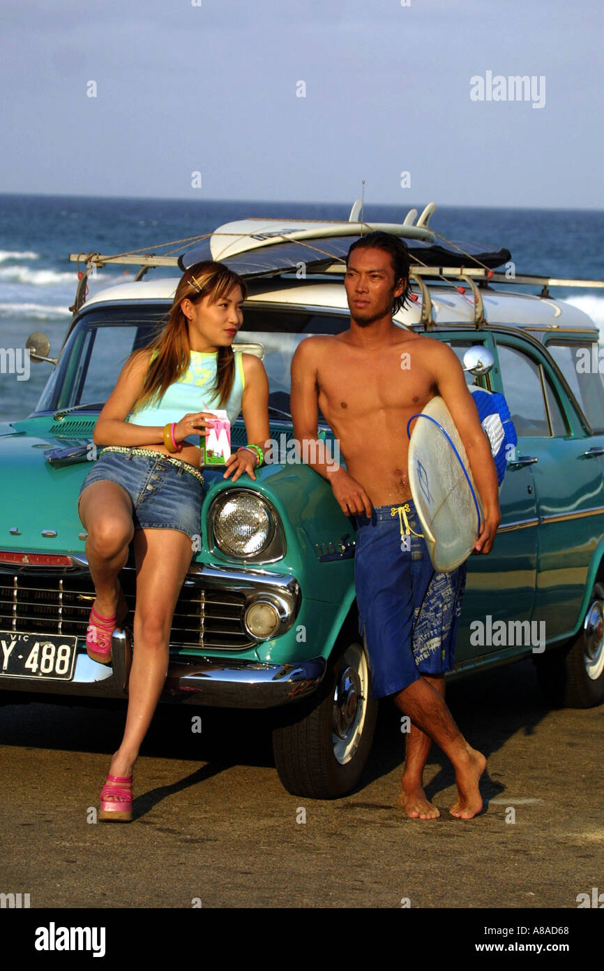 Japanese people with early model Holden Car Stock Photo