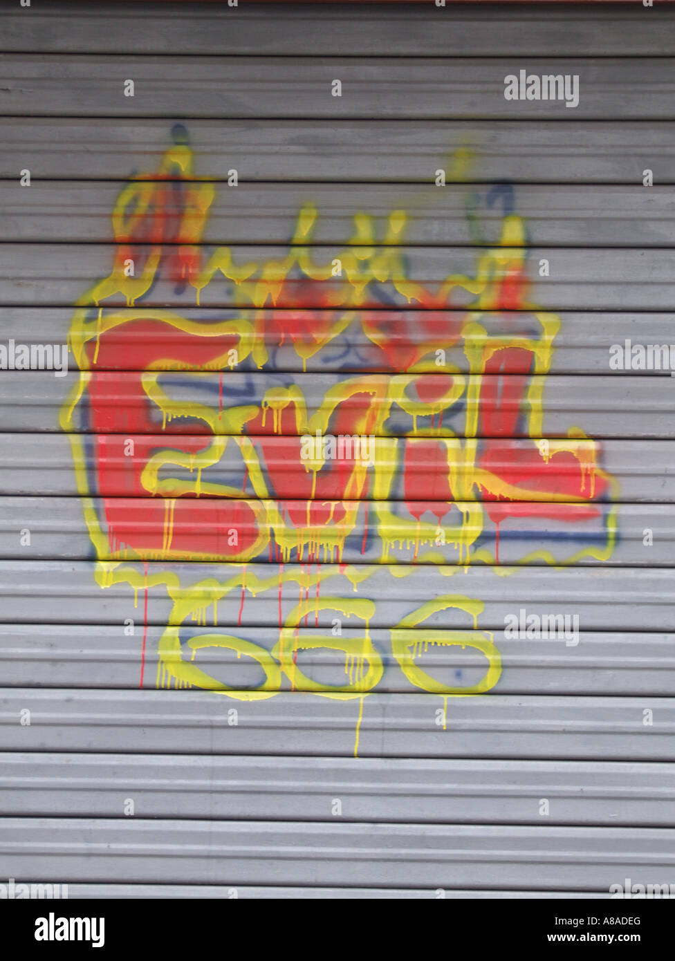 graffiti on close market stall shutter Stock Photo
