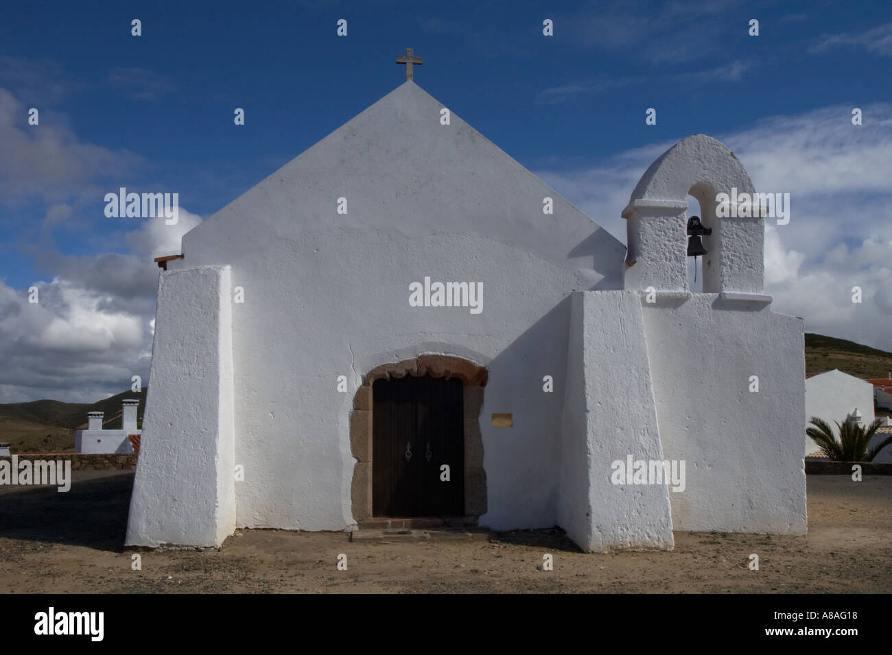 White walled gable end and bell Stock Photo - Alamy