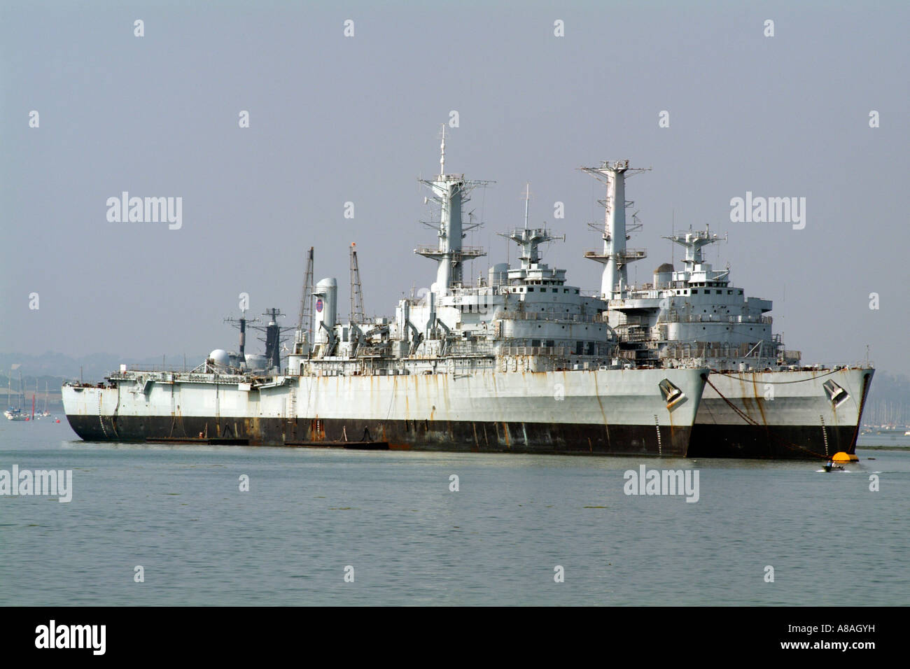 Mothballed Royal Navy ships Portsmouth Harbour England UK Stock Photo