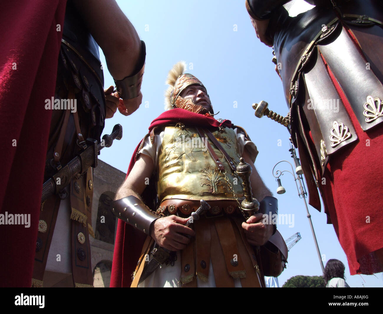 three roman soldiers in a procession celebrating the birth of Rome ...