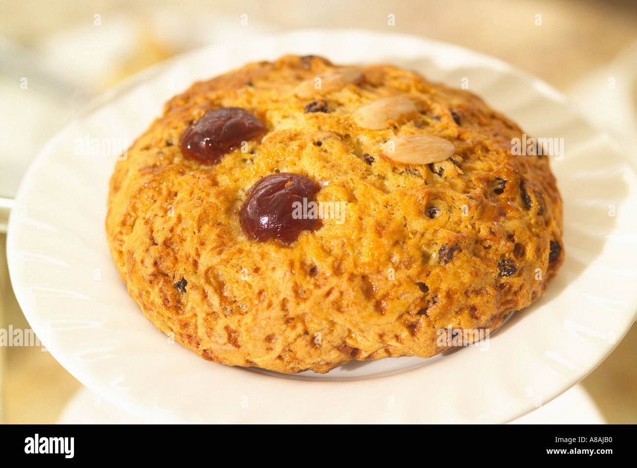A Fat Rascal served on a white plate at Bettys Cafe and Tearooms York ...