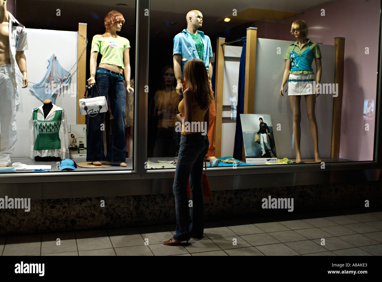 Young Woman Window Shopping Stock Photo
