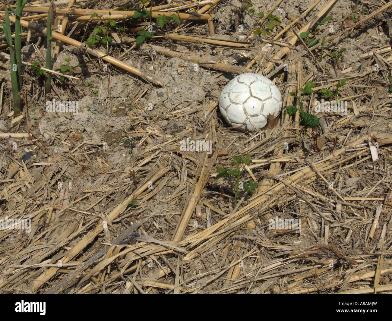Burst dirty soccer ball on hi-res stock photography and images - Alamy
