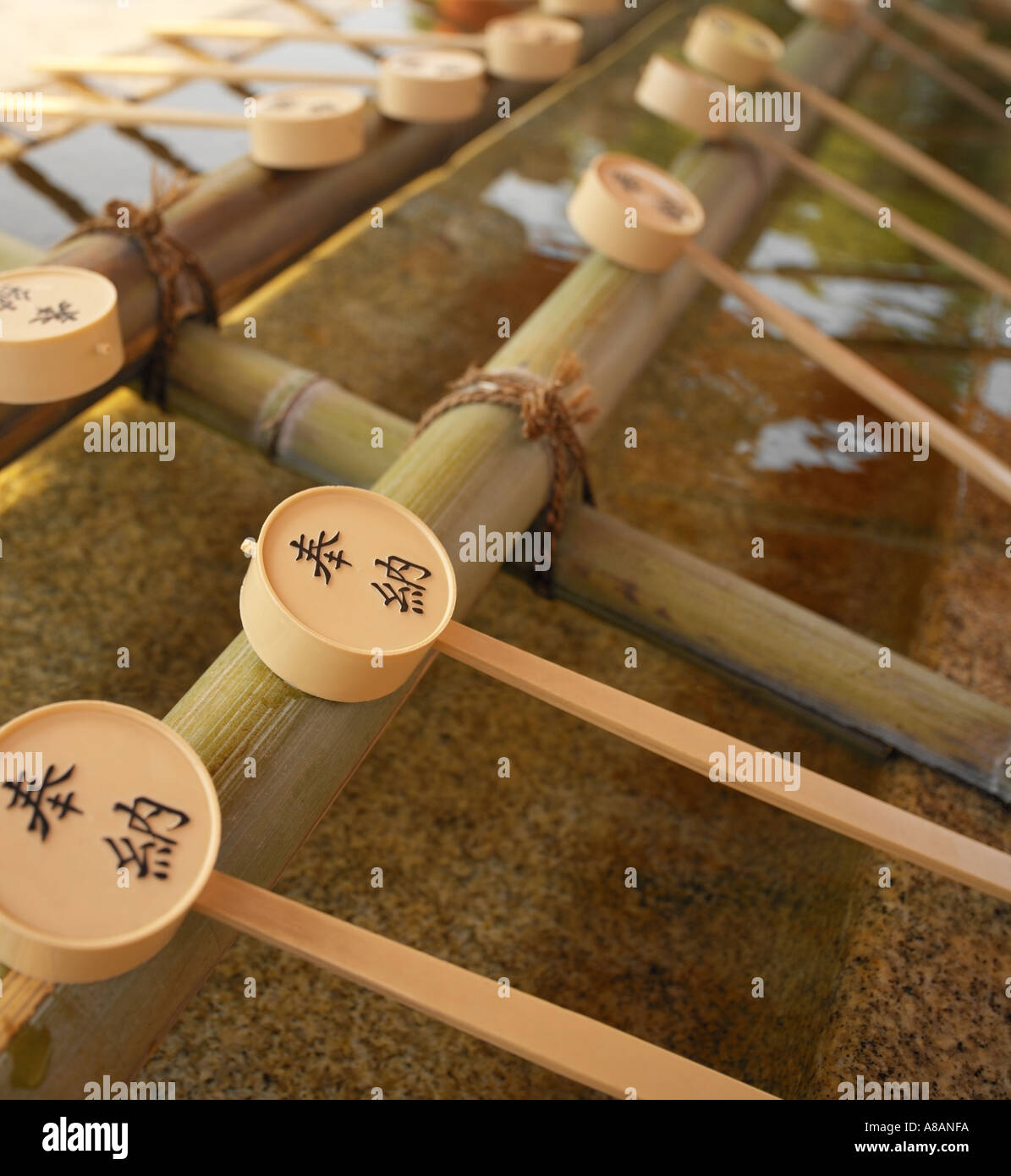Ceremonial hand washing ladles at Fushimi Inari Taisha Buddhist Temple ...