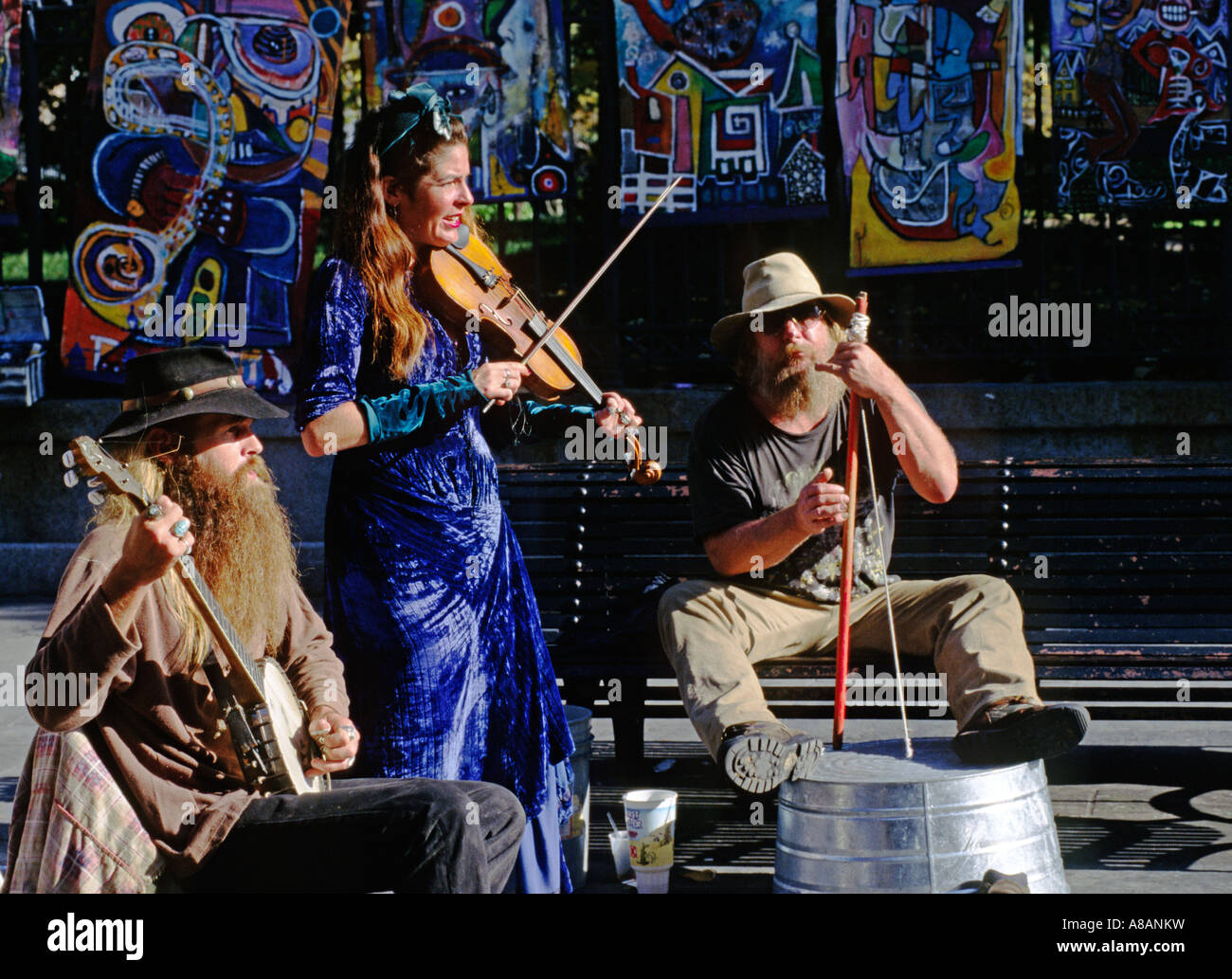 CAJUN MUSICIANS entertain the crowd at JACKSON SQUARE in the FRENCH