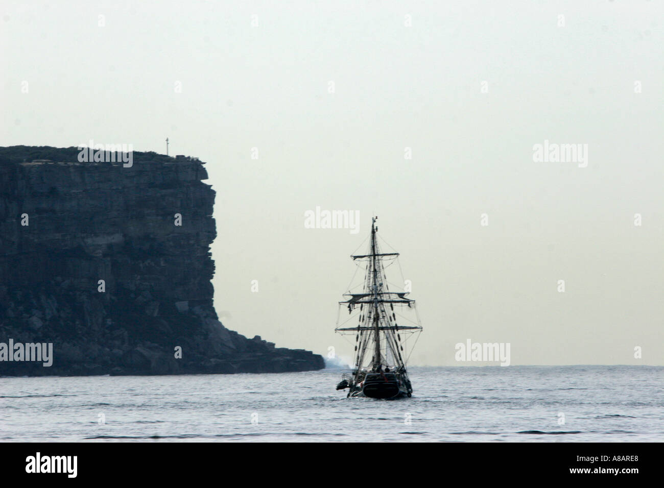 Sailing ship with North head Sydney Australia Stock Photo