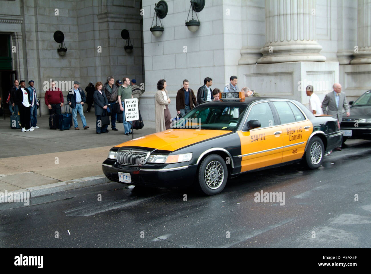 People line up to catch taxi cab at the Union Station in Washington DC