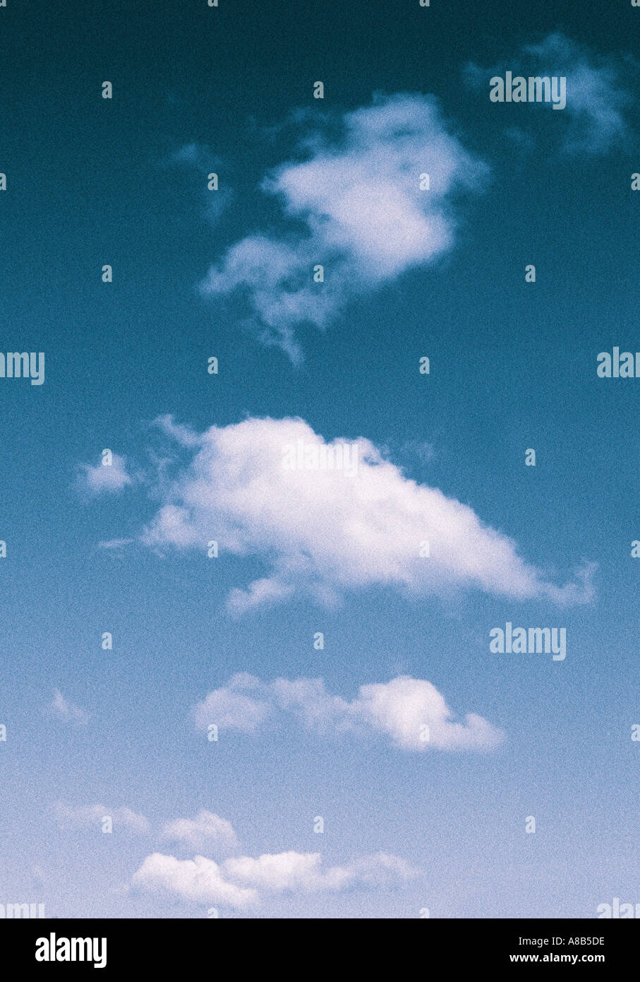 BLUE SKY SCAPE WITH WHITE CLOUDS Stock Photo