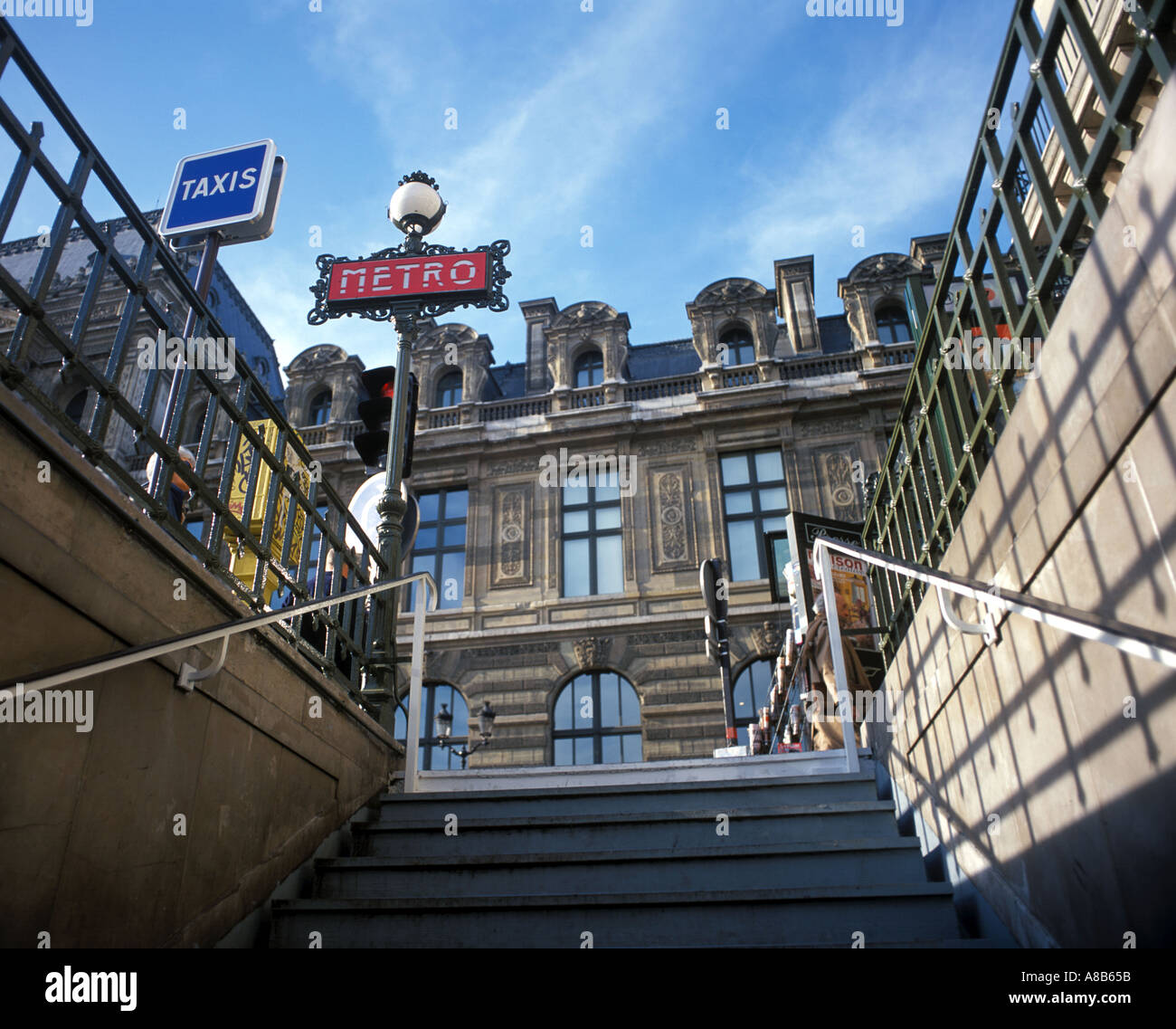 Entrance stairs to the Palais Royal Musee du Louvre with the Louvre in