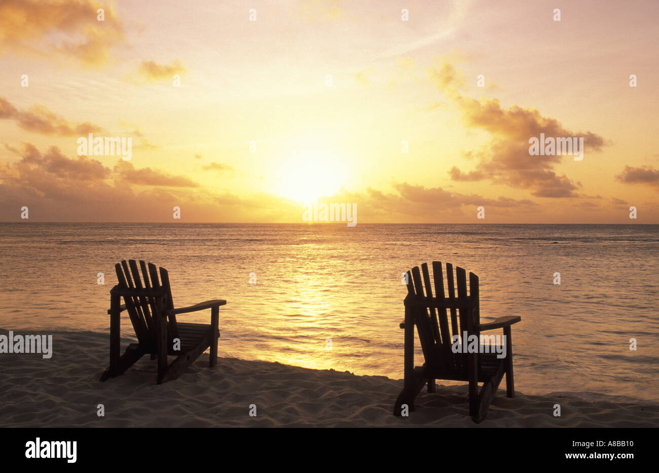 Empty sandy beach chairs hi-res stock photography and images - Alamy
