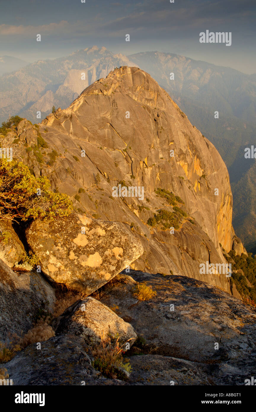 Golden Sunset light on sheer granite stone cliffs of Moro Rock Sequoia