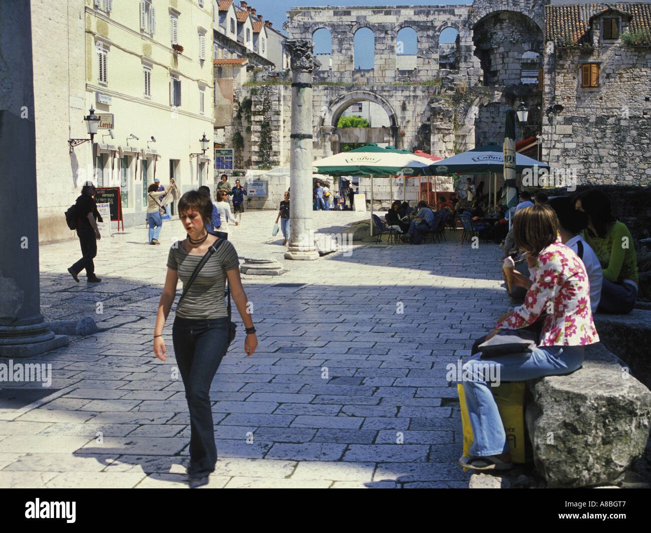 Tourists in square of the Diocletian Palace. Unesco World Heritage Site.  Split, Croatia, Former Yugoslavia, Balkans, Dalmatia. Stock Photo