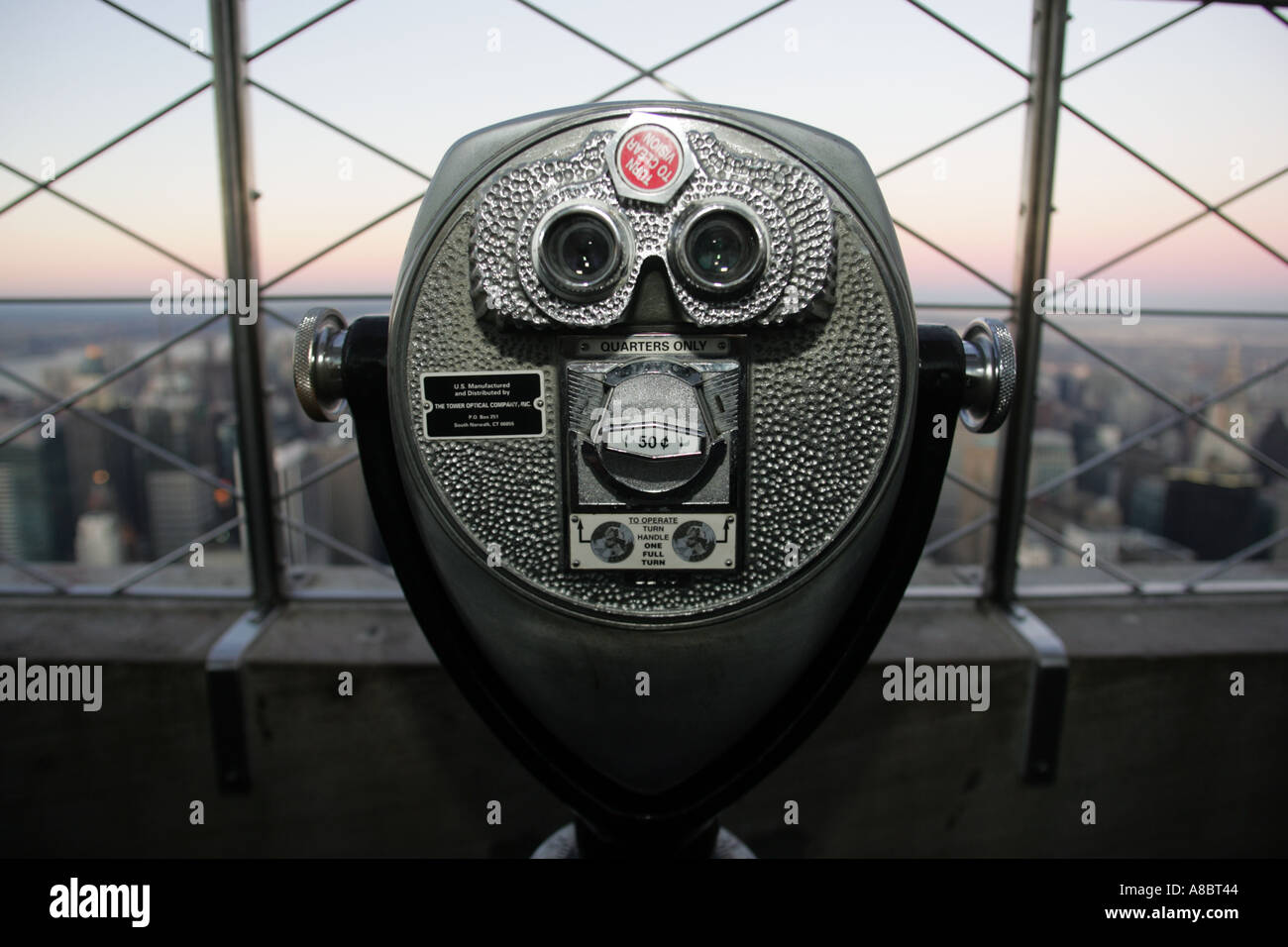 binoculars on the empire state building new york city Stock Photo Alamy