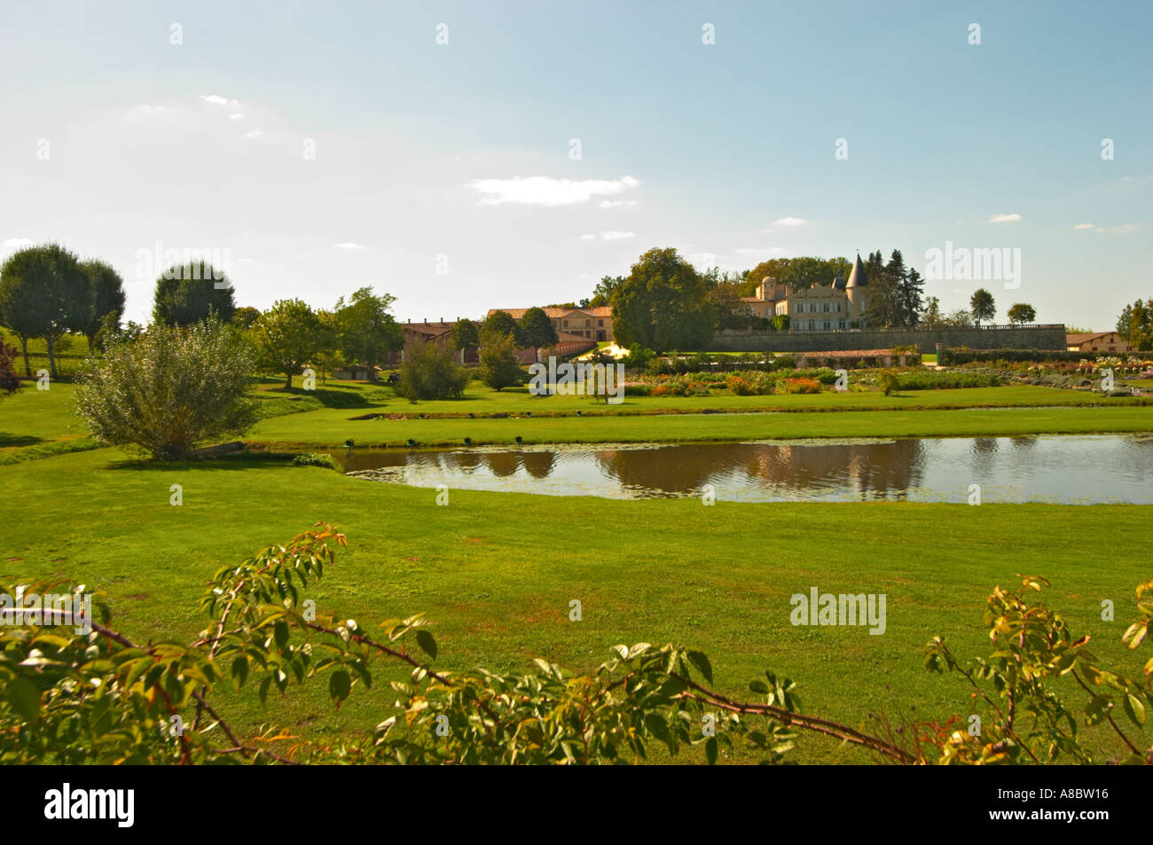 Chateau Lafite Rothschild in Pauillac, Medoc, Bordeaux, with park garden and pond Stock Photo