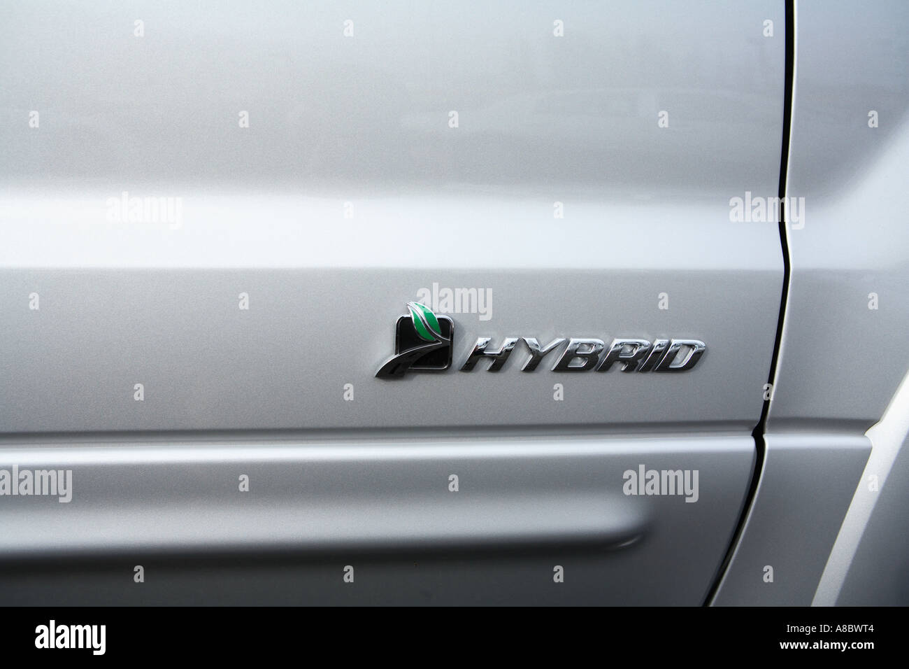 Badge on a 2006 Ford Escape Hybrid SUV Stock Photo Alamy
