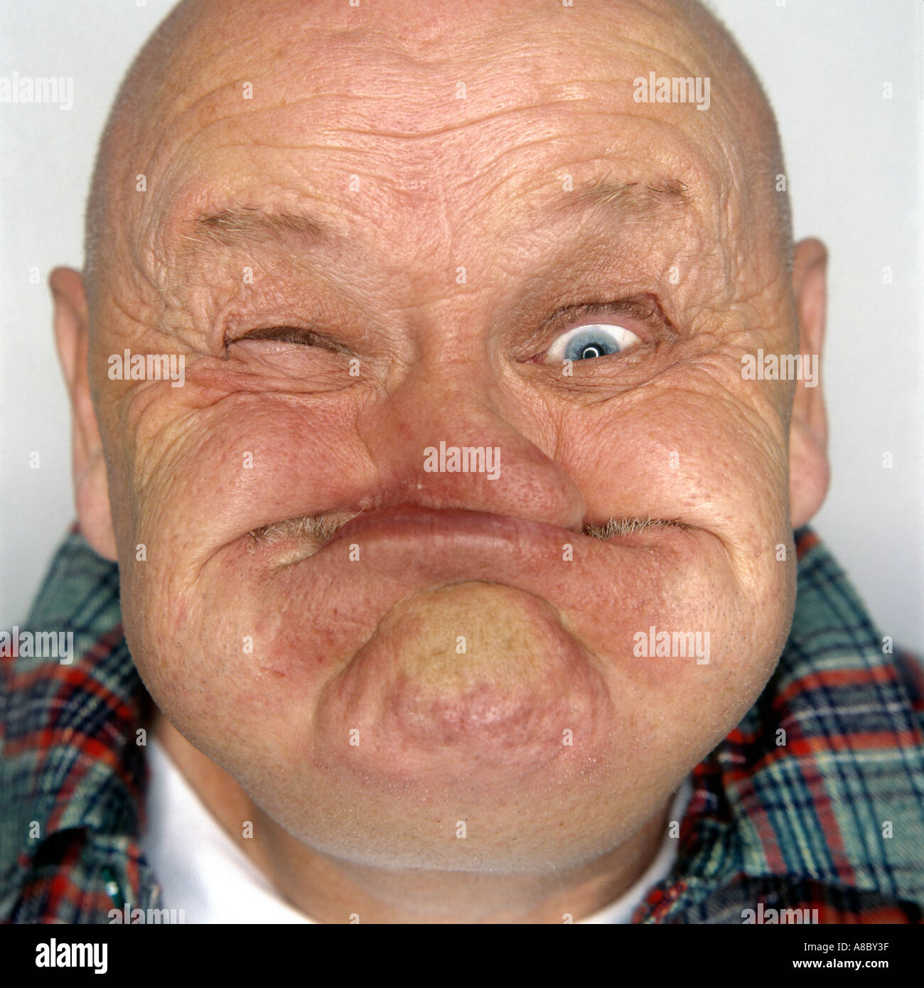Gurner from the annual world gurning festival in Cumbria UK known as the Whitehaven Egremont Crab Fair Stock Photo