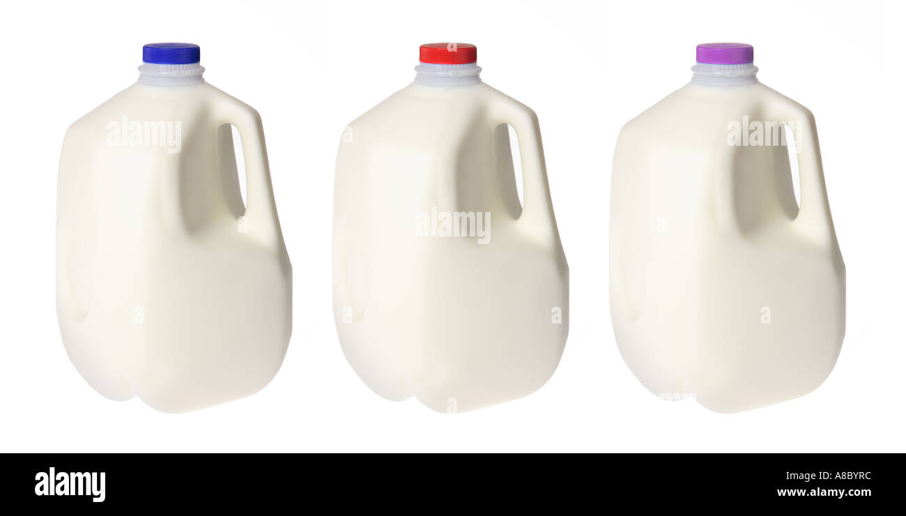 Three milk jugs with different color caps Stock Photo Alamy