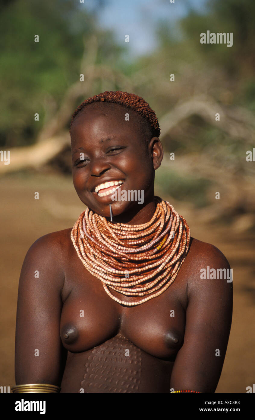 Karo girl with nail through her lip and body scarification , South Omo valley , Ethiopia Stock Photo