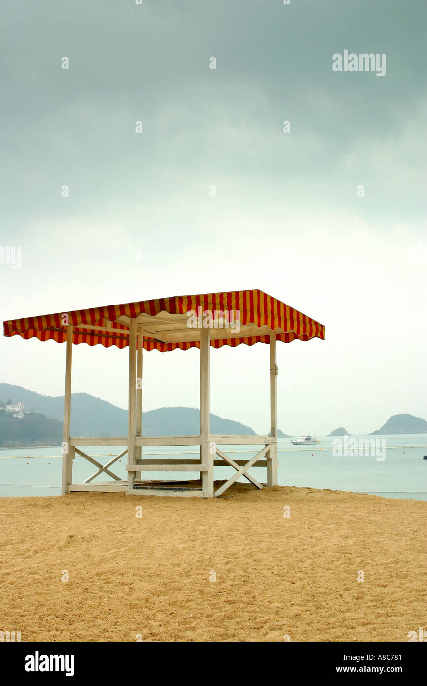 rescue pavilion save rescue deliver retrieve salvation sandy beach cloudy sea solitary lonely alone isolated thailand Travel Stock Photo