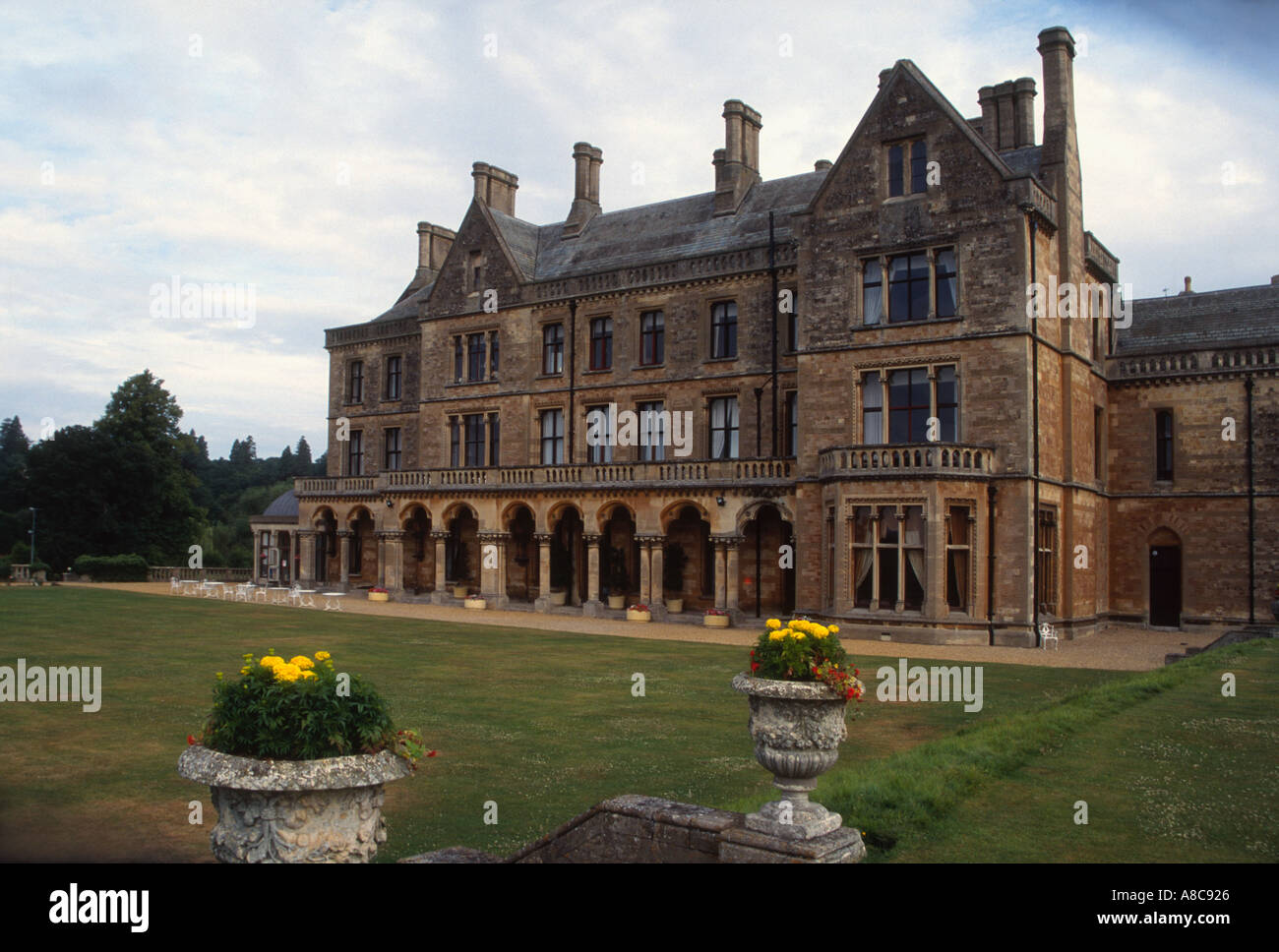 Rear of Walton Hall with flower urns in foreground Walton Warwickshire
