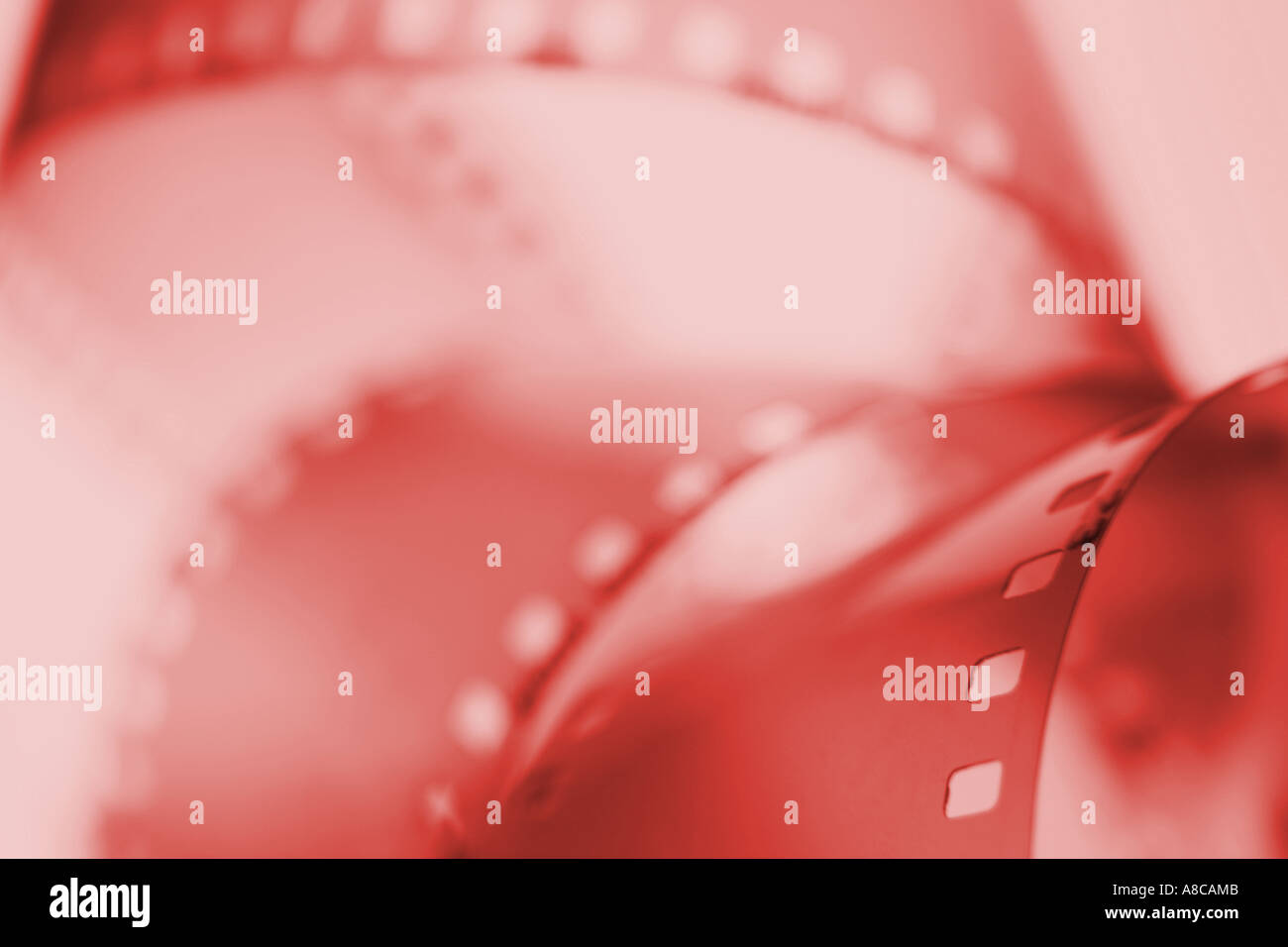 Studio close up of 35mm film with red filter Stock Photo Alamy
