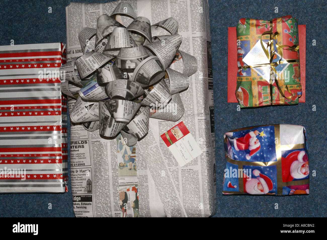 Christmas presents wrapping paper recycling Stock Photo Alamy