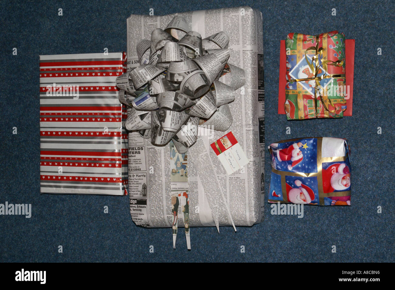 Christmas presents wrapping paper recycling Stock Photo Alamy