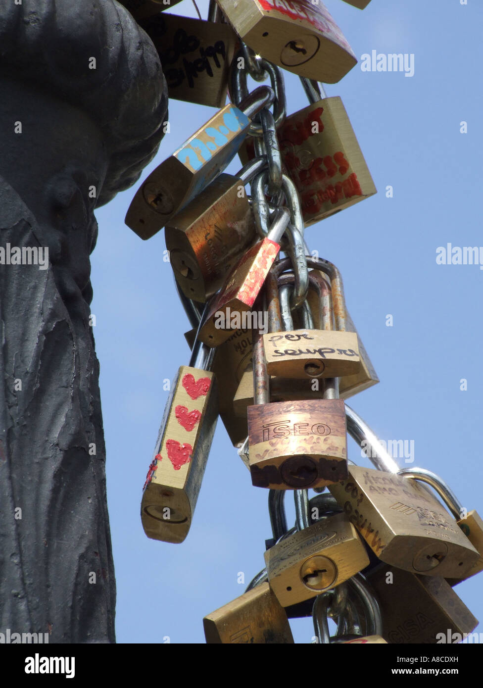 love locks on lamp post on the milvio bridge in rome, italy Stock Photo
