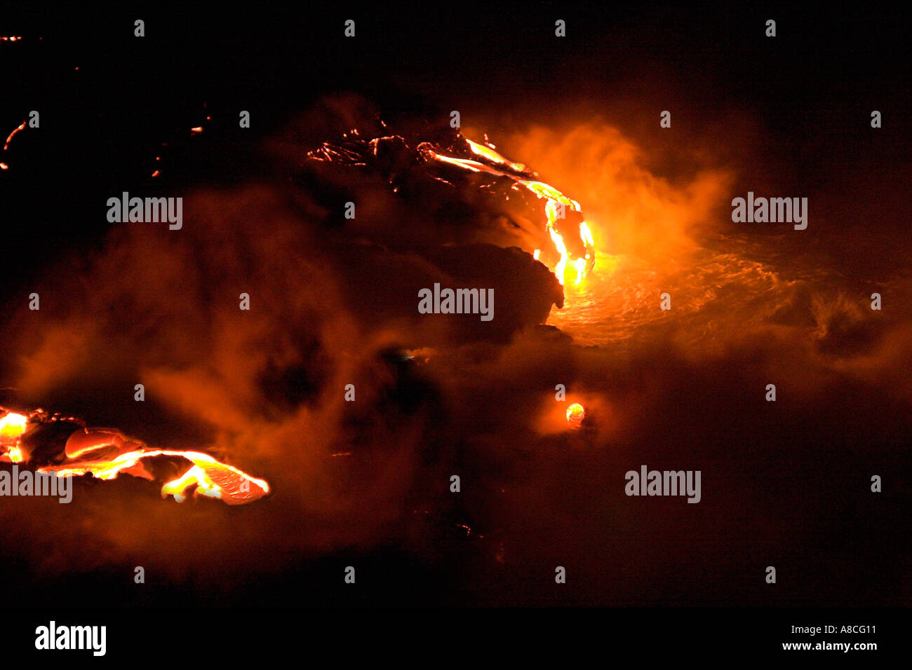Lava Waterfall flowing into the Pacific Ocean Stock Photo - Alamy