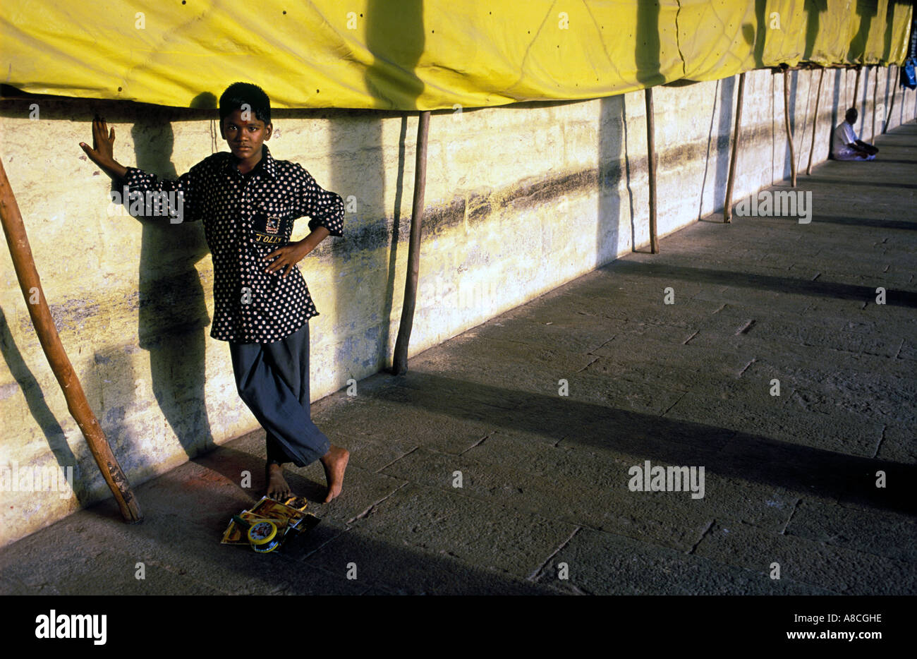 Young boy selling toys and trinkets at the Sri Meenakshi Temple