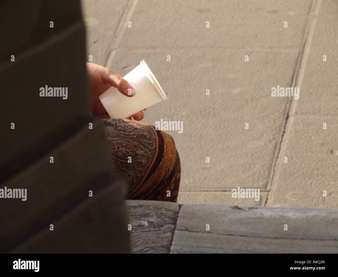 gypsy woman begging in rome Stock Photo - Alamy